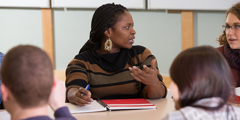 grad students discussing in class