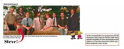 An old photo of several IT Services team members, including Steve Moore on the far left