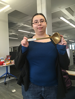 Emily Schmidt holds the golden ladle, the winning trophy of the Chili Cook-off