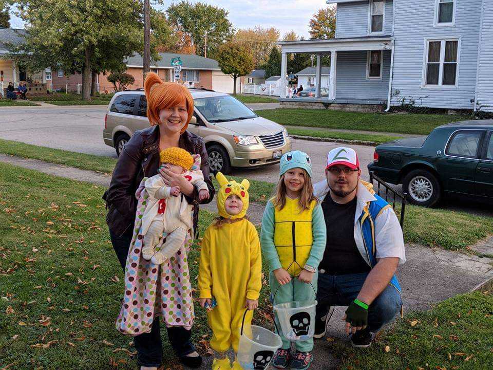 Steven Harvey (right) with his family at Halloween four years ago. The kids are dressed like Pokemon, and Steven and his wife are dressed like Ash Ketchum and Misty, respectively.