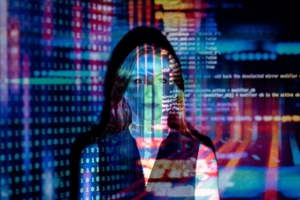 Depiction of someone in a cyberbullying situation, with digital words superimposed over her face so she is almost obscured