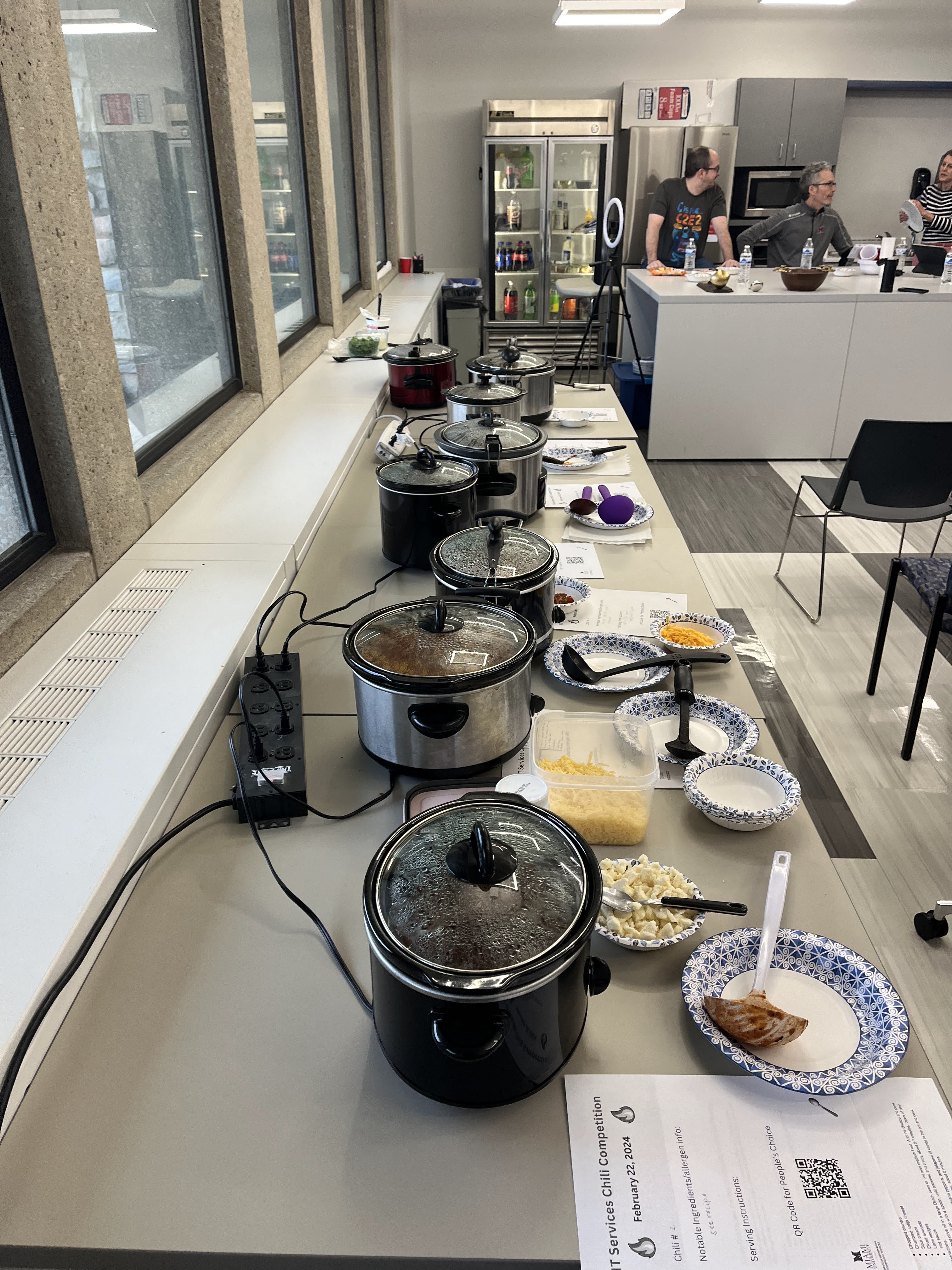 A table filled with crock pots