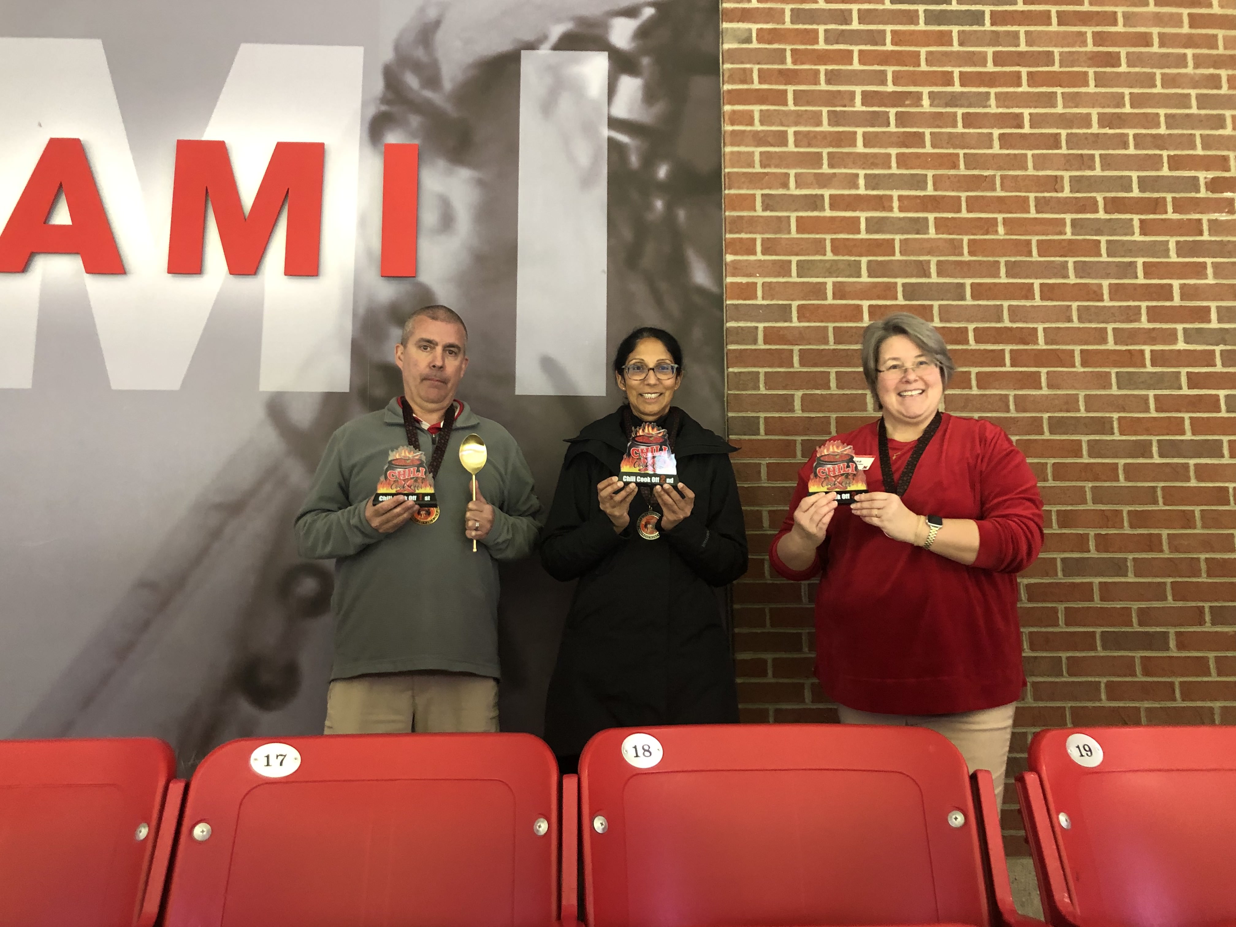 John Mihevic, Padma Patil, and Tresa Barlage Zianno, who stood in for Sarah Meaney