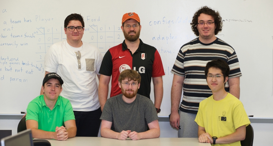 Peter Jamieson (center back row) with his summer 2015 undergraduate research students. Front row, left to right: Braden Campbell, Alan Ehret, Naoki Mizuno. Back row, Bailey Hall, Jamieson, Chris Bell (Ryan Sunderhaus not pictured. Photo by Jeff Sabo).