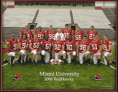 Kevin Samy with the RedHawks football team