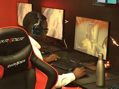 Student competes in esports game.