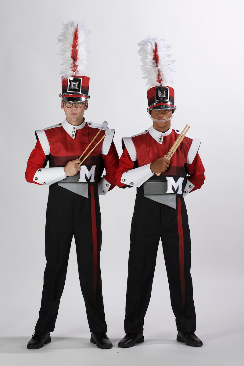 Band members in new uniforms.