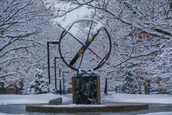 Photo of sundial in the snow.