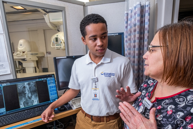 Miami University student Vincent Smith learns about imaging at the McCoullough-Hyde Hospital.