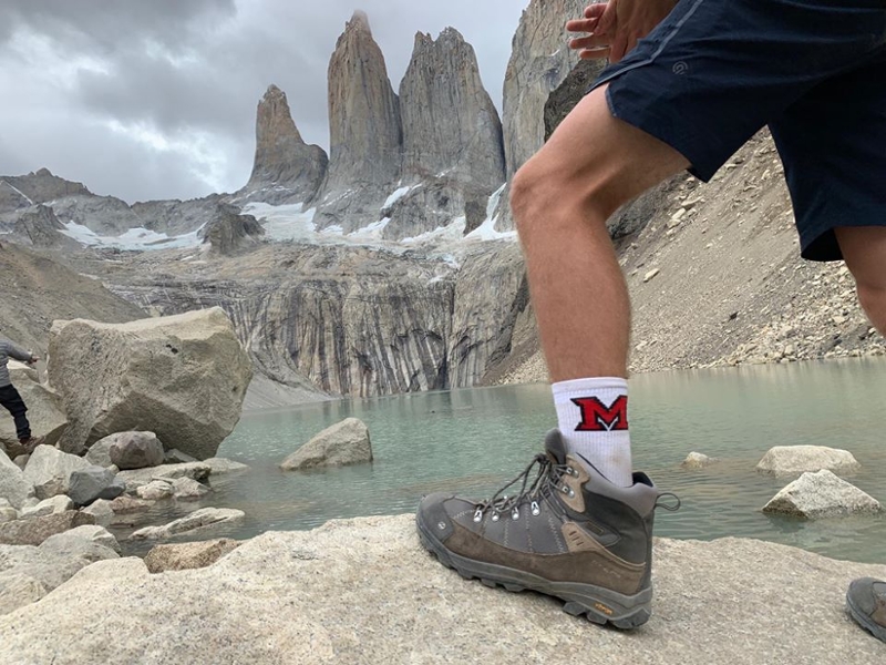Miami student Carl Resnick shows his Miami pride at Torres del Paine, a national park in Patagonia, Chile, during a study abroad trip.