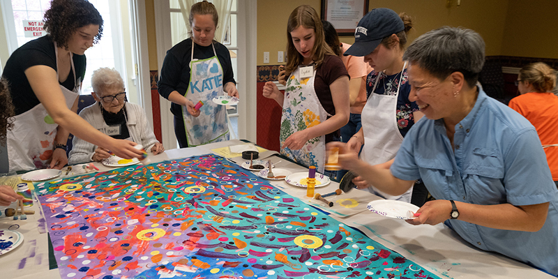 Opening Minds Through Art members work with residents at The Knolls of Oxford.