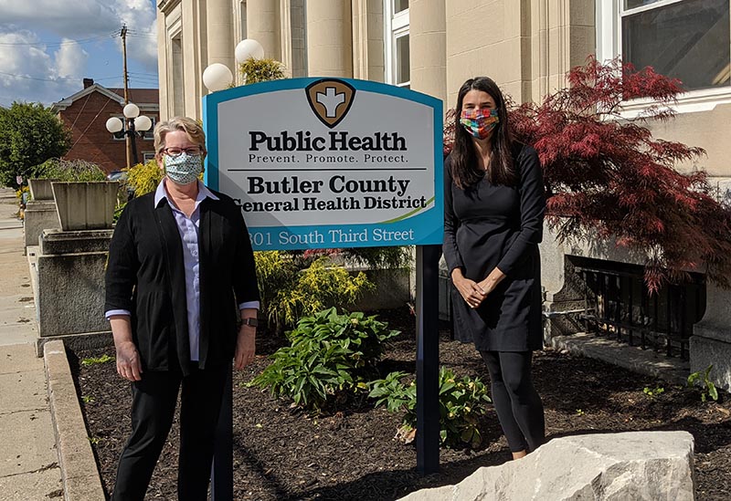 Kendall Leser (left), director of Miami's public health program, works with Jennifer Bailer (Miami '81), Butler County health commissioner.