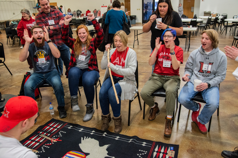 Myaamia students, who attend Miami University, play the Moccasin Game at the 2019 Miami Tribe of Oklahoma’s annual Winter Gathering in Miami, Oklahoma.