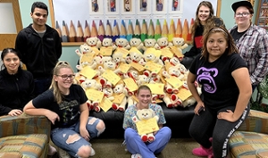 Regionals students with bears they made for foster children