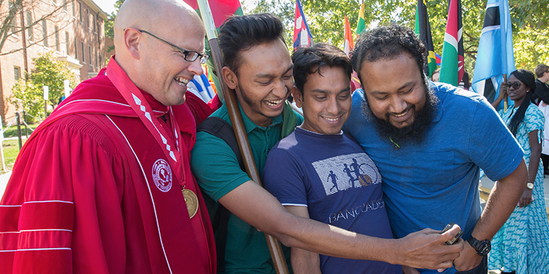  A group of students take a selfie with President Crawford