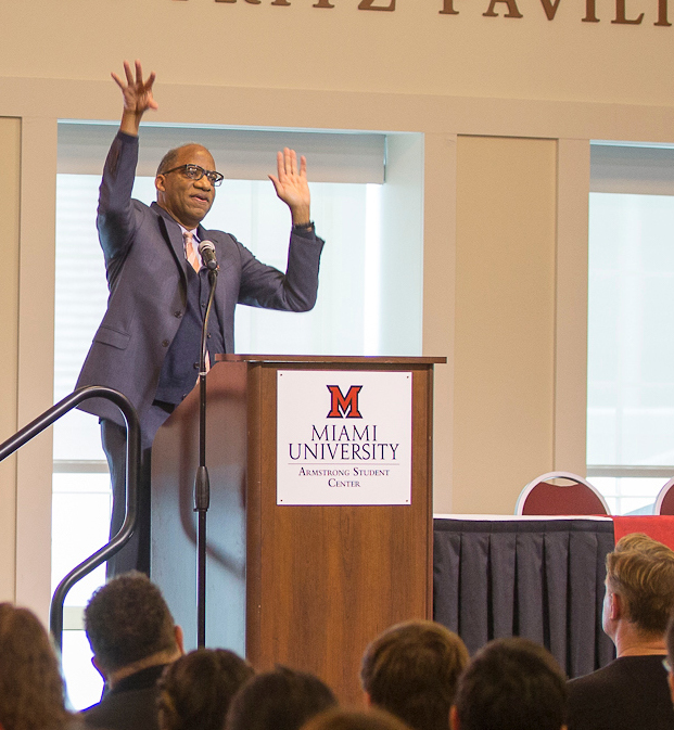 Wil Haygood animatedly speaking to an audience of Miami students