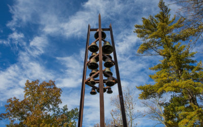 The Molyneaux bells on Western Campus, against a blue sky