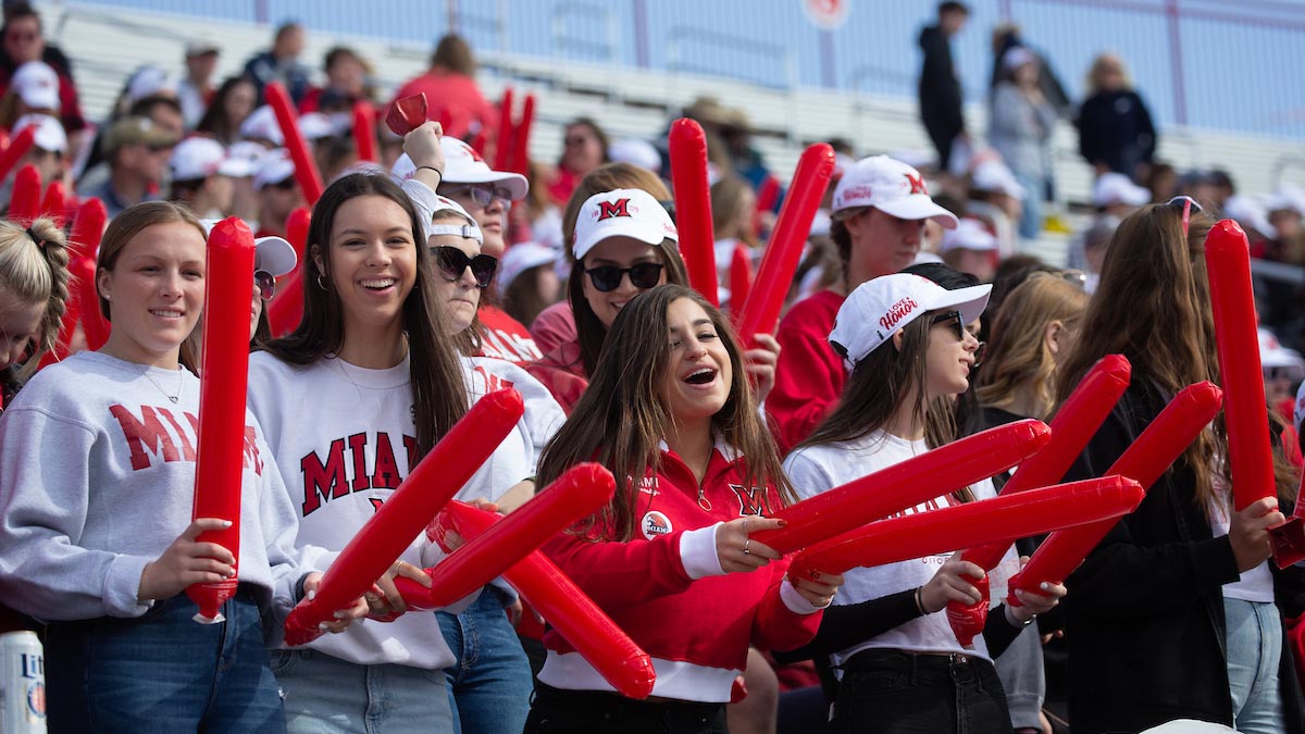 Miami students celebrating at a football game