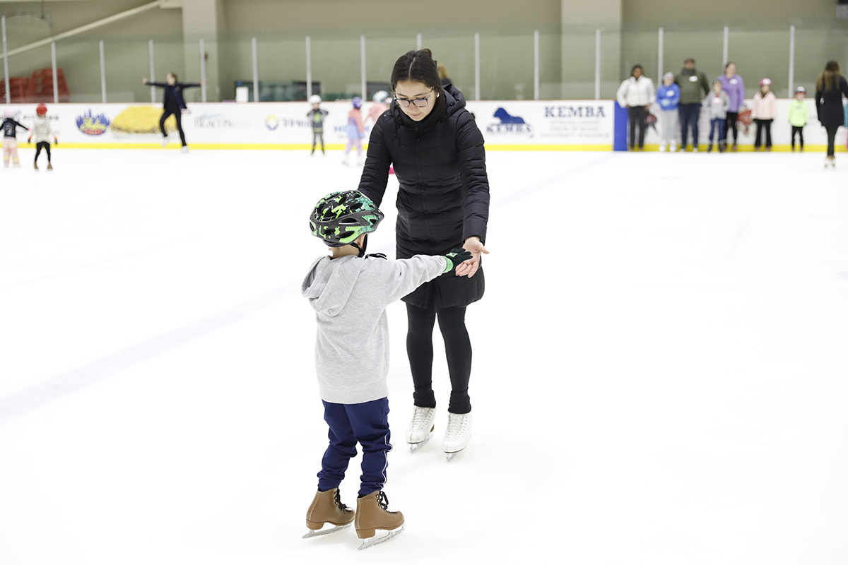 kid learning how to skate