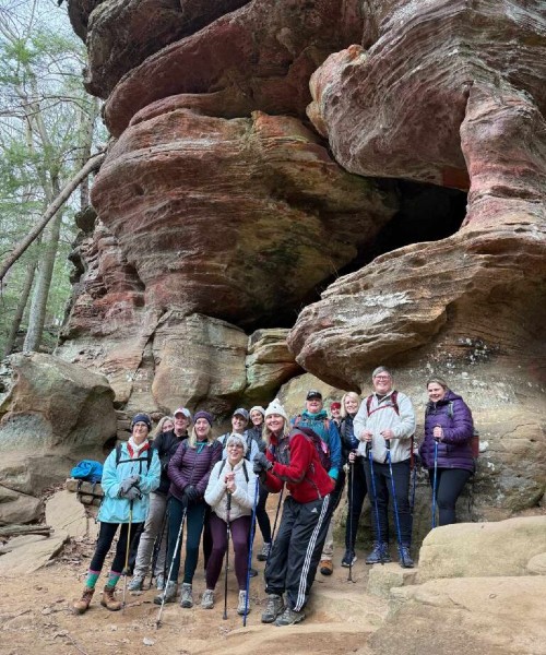 A group of women hiking who are a members of Move Beyond Surviving, a nonprofit that inspires breast cancer survivors to overcome and thrive.