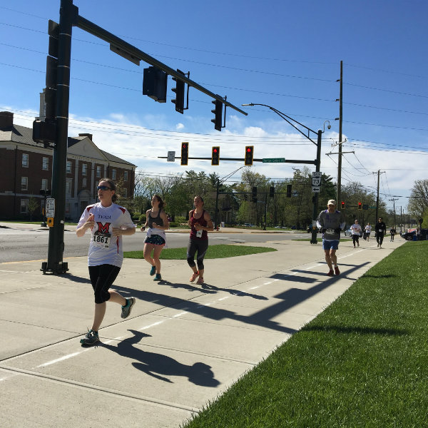 Group of people running outside