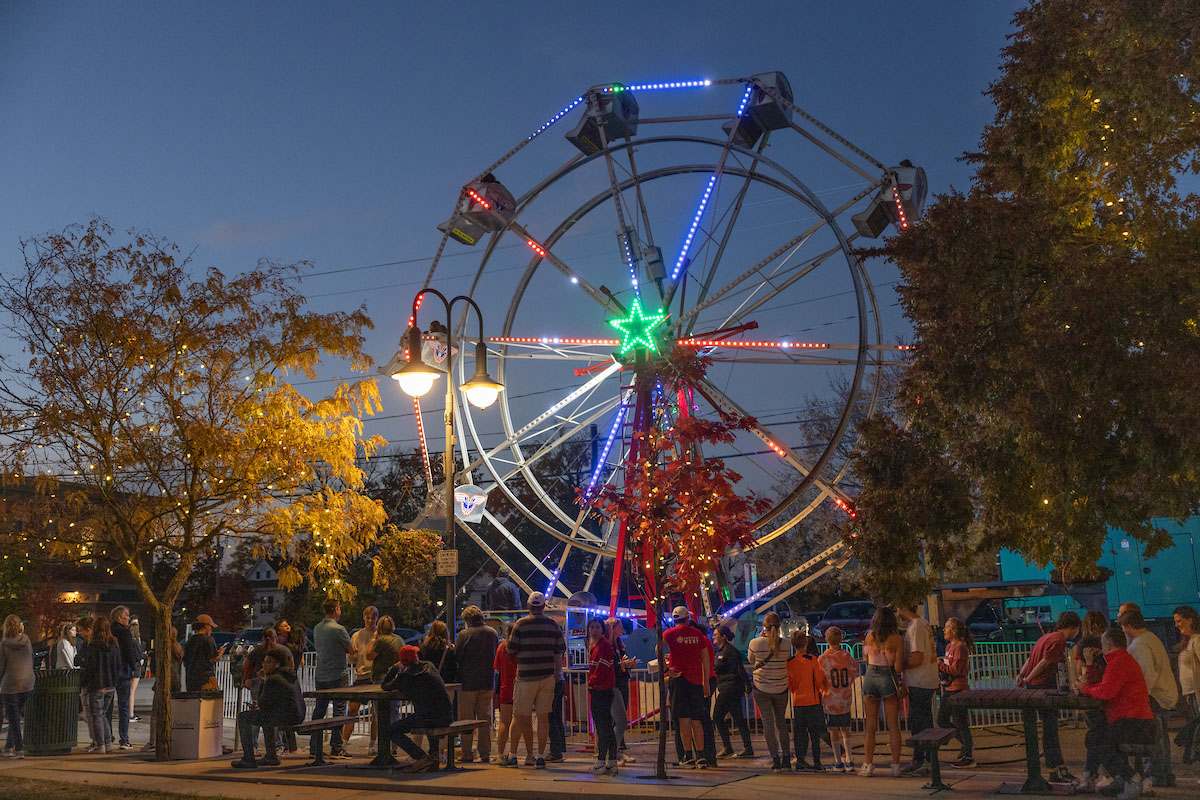 An image of a lit Ferris wheel at night on Miami's Oxford campus