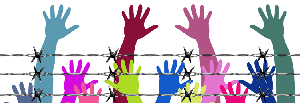 drawing of hands reaching above barbed wire