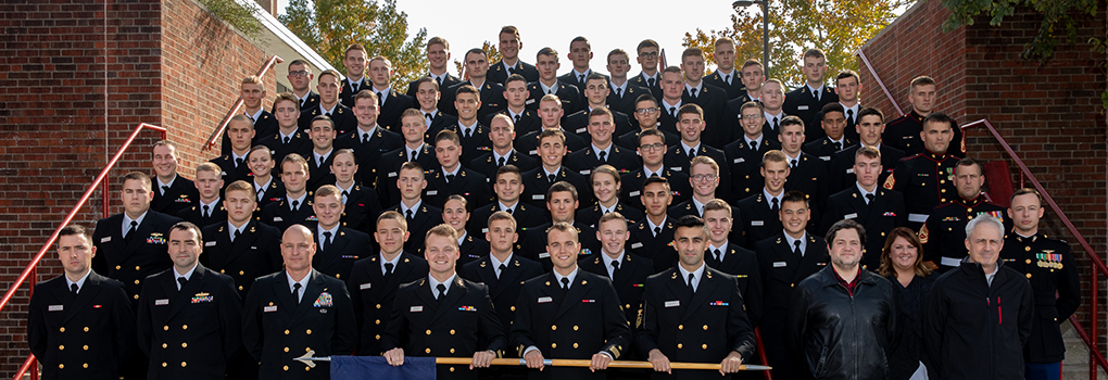 formal photo of Miami NROTC staff and students
