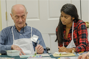 Student working with an OMA Artist