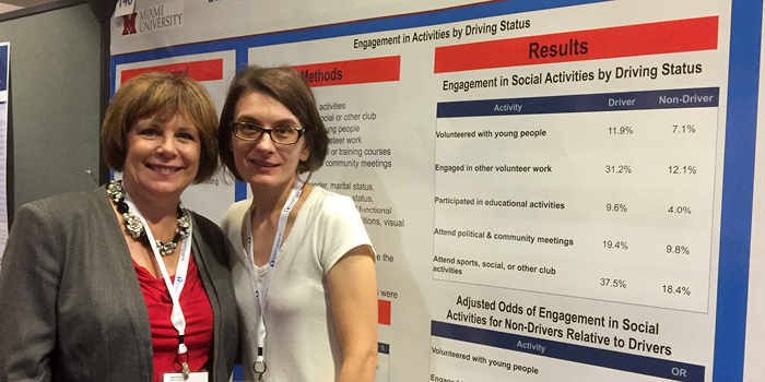Karen Brown and Sara McLaughlin share their research findings at a national conference