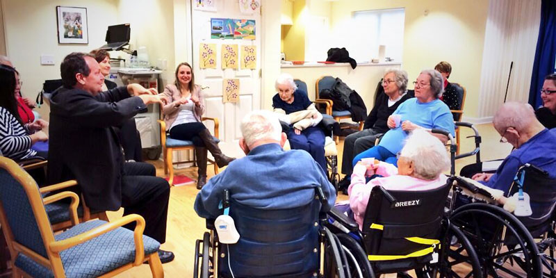 Glazner conducts a poetry session with residents in a recent visit to Oxford and Miami's campus