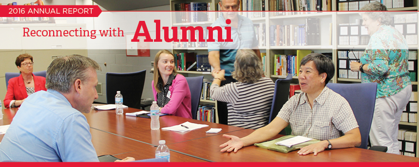 Image: Alumni meeting in a conference room. Text: Reconnecting with Alumni