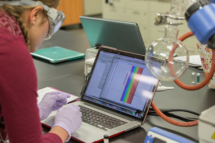 student working in lab