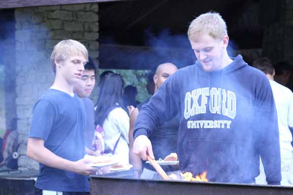 President Ethan Clements grilling at the picnic