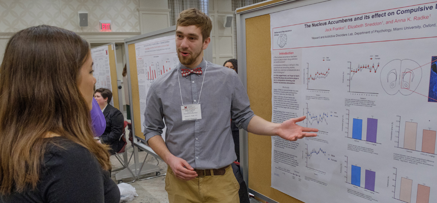 Student presenting a poster