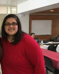 Photograph of Suchi Daga in an office environment.
