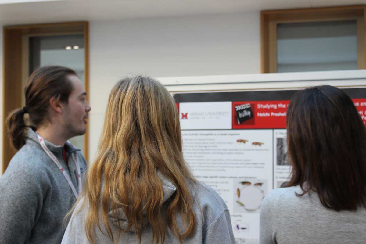 Current student talks to potential students about their research