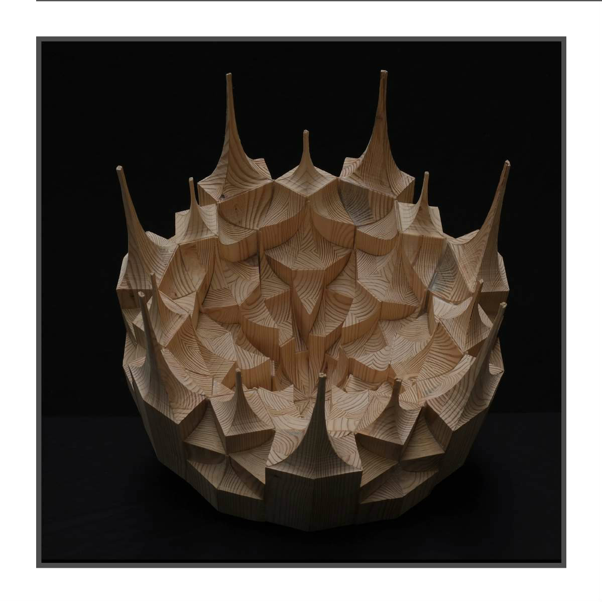 wooden sculpture with spikes