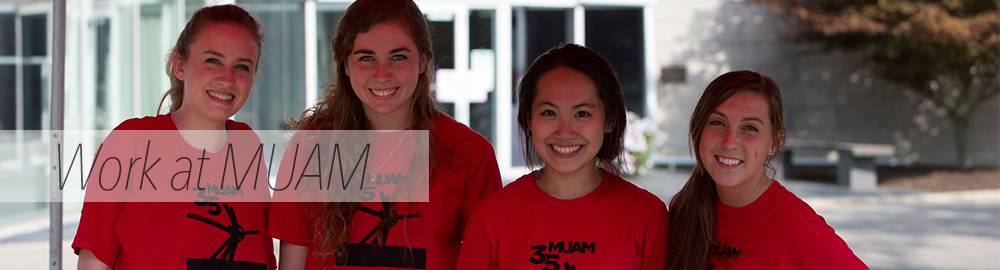 Smiling students wearing matching red tshirts face the camera. Text: Work at MUAM
