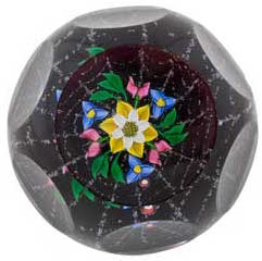 Floral design in a glass paperweight