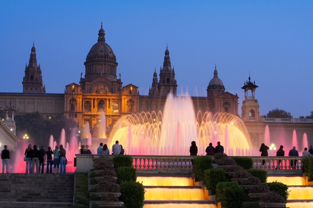 Evening view of fountains and architecture in Barcelona