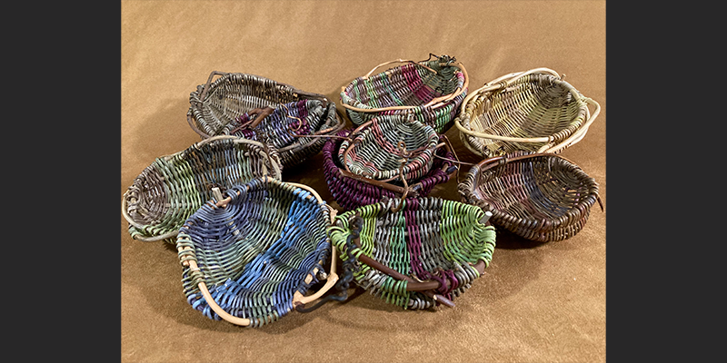  group of colorful woven baskets