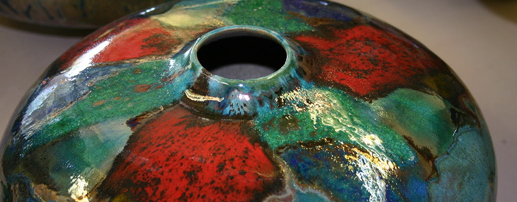 A shimmering multicolored pot 