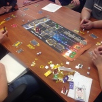 Players at a table playing game From Earth to Mars 