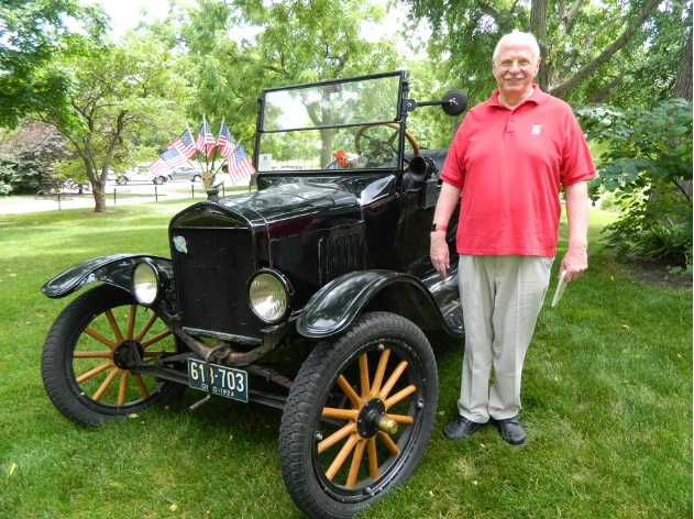 George Beverley stands by John Clover's 1924 Model T car