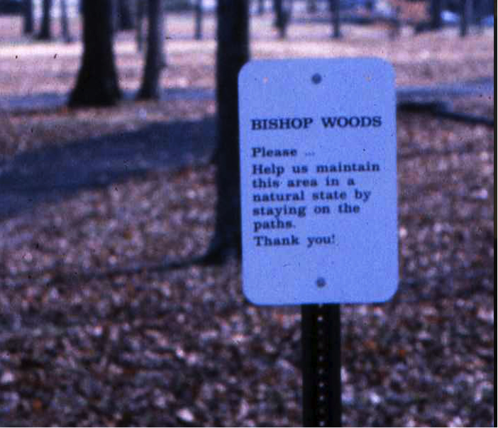 Signage in Bishop Woods, 1986, reading 