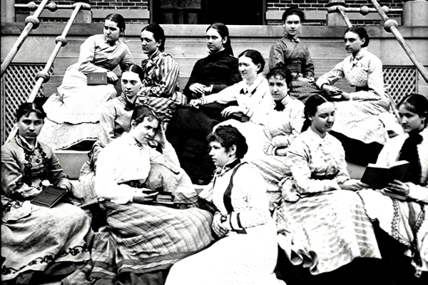 Women from the Western College class of 1877 pose on the steps of Peabody Hall