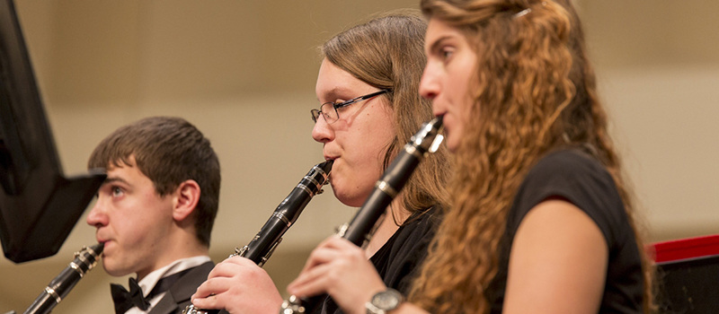  A row of clarinet players perform with the Symphony Band