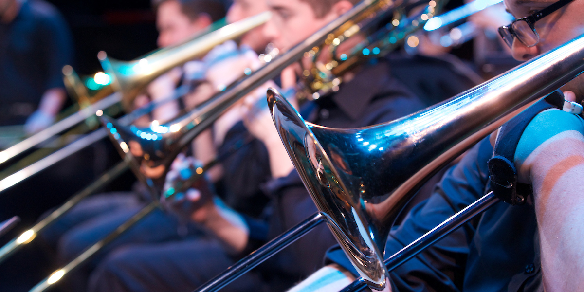 A row of trombones seen during a Jazz Ensemble performance