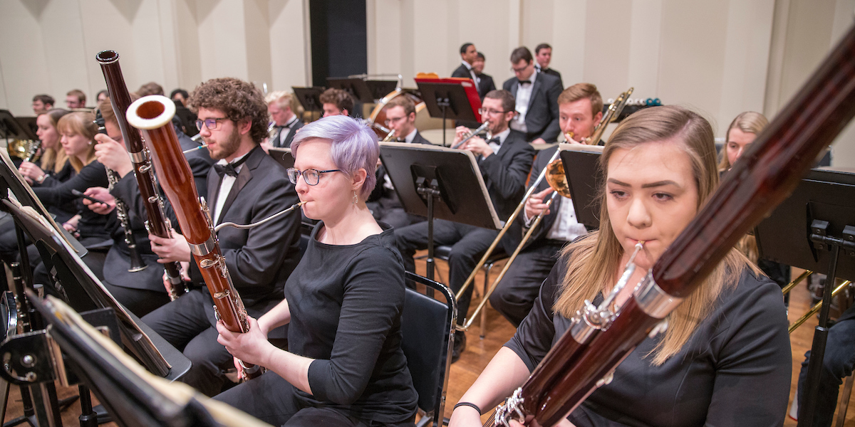 Bassoon players perform during orchestra concert